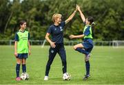 18 July 2022; Republic of Ireland women's team manager Vera Pauw with Kathryn Lynch, left, and Emily Duffy during a visit to the INTERSPORT Elverys FAI Summer Soccer Schools Camp at PRL Park in Greenogue, Dublin. Photo by Stephen McCarthy/Sportsfile