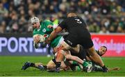 16 July 2022; Mack Hansen of Ireland is tackled by Nepo Laulala of New Zealand during the Steinlager Series match between the New Zealand and Ireland at Sky Stadium in Wellington, New Zealand. Photo by Brendan Moran/Sportsfile