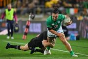 16 July 2022; James Lowe of Ireland is tackled by Jordie Barrett of New Zealand during the Steinlager Series match between the New Zealand and Ireland at Sky Stadium in Wellington, New Zealand. Photo by Brendan Moran/Sportsfile