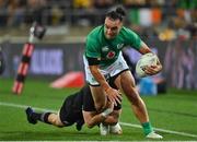 16 July 2022; James Lowe of Ireland is tackled by Jordie Barrett of New Zealand during the Steinlager Series match between the New Zealand and Ireland at Sky Stadium in Wellington, New Zealand. Photo by Brendan Moran/Sportsfile