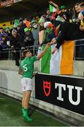 16 July 2022; Hugo Keenan of Ireland celebrates with supporters after the Steinlager Series match between the New Zealand and Ireland at Sky Stadium in Wellington, New Zealand. Photo by Brendan Moran/Sportsfile