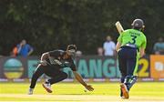 18 July 2022; Ish Sodhi of New Zealand fails to catch the sho by Lorcan Tucker of Ireland during the Men's T20 International match between Ireland and New Zealand at Stormont in Belfast. Photo by Ramsey Cardy/Sportsfile