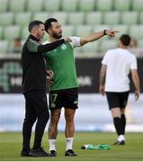 19 July 2022; Shamrock Rovers manager Stephen Bradley, left, in converation with Richie Towell before the UEFA Champions League 2022/23 Second Qualifying Round First Leg match between Ludogorets and Shamrock Rovers at Huvepharma Arena in Razgrad, Bulgaria. Photo by Alex Nicodim/Sportsfile