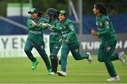 19 July 2022; Pakistan players celebrate a wicket during the Women's T20 International match between Ireland and Pakistan at Bready Cricket Club in Bready, Tyrone. Photo by Ramsey Cardy/Sportsfile