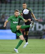 19 July 2022; Igor Plastun of Ludogorets in action against Graham Burke of Shamrock Rovers during the UEFA Champions League 2022/23 Second Qualifying Round First Leg match between Ludogorets and Shamrock Rovers at Huvepharma Arena in Razgrad, Bulgaria. Photo by Alex Nicodim/Sportsfile