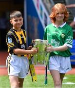 17 July 2022; Mascots and Cuala GAA players Oleksardz Rosolvych and Dasha Harbarchuk bring out the Liam MacCarthy Cup before the GAA Hurling All-Ireland Senior Championship Final match between Kilkenny and Limerick at Croke Park in Dublin. Photo by Piaras Ó Mídheach/Sportsfile