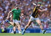17 July 2022; Eoin Cody of Kilkenny shoots as Graeme Mulcahy of Limerick closes in during the GAA Hurling All-Ireland Senior Championship Final match between Kilkenny and Limerick at Croke Park in Dublin. Photo by Piaras Ó Mídheach/Sportsfile