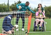 21 July 2022; Republic of Ireland U21s Manager Jim Crawford with participant Mairead Hanlon, and coach Shannen Cotter during his visit to the Football For All Summer Soccer School at St Patrick's Boys AFC in Carlow. Photo by Seb Daly/Sportsfile