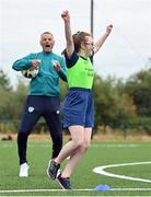 21 July 2022; Republic of Ireland U21s Manager Jim Crawford and participant Sarah Blake celebrate a goal during his visit to the Football For All Summer Soccer School at St Patrick's Boys AFC in Carlow. Photo by Seb Daly/Sportsfile