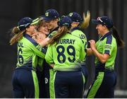 21 July 2022; Georgina Dempsey of Ireland, centre celebrates with team mates Leah Paul, left, Orla Prendergast, Cara Murrary, Gaby Lewis and Arlene Kelly after she takes her sides first wicket during the Women's T20 International match between Ireland and Australia at Bready Cricket Club in Bready, Tyrone. Photo by George Tewkesbury/Sportsfile