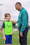 21 July 2022; Republic of Ireland U21s Manager Jim Crawford and participant Cillian Mullins during the Football For All Summer Soccer School at St Patrick's Boys AFC in Carlow. Photo by Seb Daly/Sportsfile