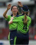 21 July 2022; Ava Canning of Ireland celebrates with team mate Georgina Dempsey after she takes her sides third wicket during the Women's T20 International match between Ireland and Australia at Bready Cricket Club in Bready, Tyrone. Photo by George Tewkesbury/Sportsfile