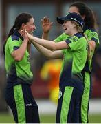 21 July 2022; Georgina Dempsey of Ireland celebrates with team mate Arlene Kelly after she takes her sides third wicket during the Women's T20 International match between Ireland and Australia at Bready Cricket Club in Bready, Tyrone. Photo by George Tewkesbury/Sportsfile