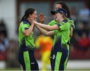 21 July 2022; Georgina Dempsey of Ireland celebrates with team mate Arlene Kelly after she takes her sides third wicket during the Women's T20 International match between Ireland and Australia at Bready Cricket Club in Bready, Tyrone. Photo by George Tewkesbury/Sportsfile