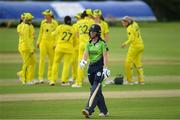 21 July 2022; A dejected Orla Prendergast of Ireland walks back to the pavilion after being caught out during the Women's T20 International match between Ireland and Australia at Bready Cricket Club in Bready, Tyrone. Photo by George Tewkesbury/Sportsfile