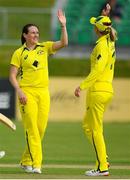 21 July 2022; Megan Schutt of Australia celebrates with team mate Meg Lanning after she takes her sides fifth wicket during the Women's T20 International match between Ireland and Australia at Bready Cricket Club in Bready, Tyrone. Photo by George Tewkesbury/Sportsfile
