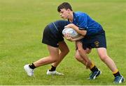 21 July 2022; Dillon Smyth is tackled by Alex Bulmer during the Bank of Ireland Leinster Rugby School of Excellence at The King's Hospital School in Dublin. Photo by Harry Murphy/Sportsfile