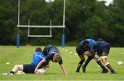 21 July 2022; Participants practice tackling during the Bank of Ireland Leinster Rugby School of Excellence at The King's Hospital School in Dublin. Photo by Harry Murphy/Sportsfile