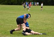 21 July 2022; Eddie Darcy is tackled by Conor Mulligan during the Bank of Ireland Leinster Rugby School of Excellence at The King's Hospital School in Dublin. Photo by Harry Murphy/Sportsfile