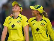 21 July 2022; Tahlia McGrath of Australia, left, celebrates with team mate Meg Lanning after their side's victory in the Women's T20 International match between Ireland and Australia at Bready Cricket Club in Bready, Tyrone. Photo by George Tewkesbury/Sportsfile