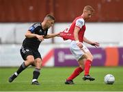 21 July 2022; Eoin Doyle of St Patrick's Athletic in action against Amar Beganovic of Mura during the UEFA Europa Conference League 2022/23 Second Qualifying Round First Leg match between St Patrick's Athletic and NS Mura at Richmond Park in Dublin. Photo by Stephen McCarthy/Sportsfile