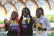 21 July 2022; Shericka Jackson of Jamaica, centre, who won gold, Shelly-Ann Fraser-Pryce of Jamaica, left, who won silver, and Dina Asher-Smith of Great Britain, who won bronze, celebrate after the Women's 200m final during day seven of the World Athletics Championships at Hayward Field in Eugene, Oregon, USA. Photo by Sam Barnes/Sportsfile