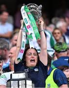 17 July 2022; Limerick performance psychologist Caroline Currid lifts the Liam MacCarthy Cup after her side's victory in the GAA Hurling All-Ireland Senior Championship Final match between Kilkenny and Limerick at Croke Park in Dublin. Photo by Piaras Ó Mídheach/Sportsfile