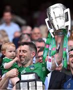 17 July 2022; Graeme Mulcahy of Limerick and one year old Róise celebrate with the Liam MacCarthy Cup after the GAA Hurling All-Ireland Senior Championship Final match between Kilkenny and Limerick at Croke Park in Dublin. Photo by Piaras Ó Mídheach/Sportsfile