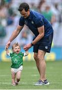 17 July 2022; Limerick selector Paul Kinnerk celebrates with his daughter Enya on the pitch after GAA Hurling All-Ireland Senior Championship Final match between Kilkenny and Limerick at Croke Park in Dublin. Photo by Piaras Ó Mídheach/Sportsfile