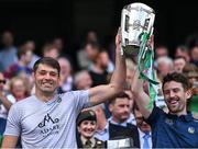 17 July 2022; Limerick physiotherapists Mark Melbourne and Sean McAuliffe, right, lift the Liam MacCarthy Cup after the GAA Hurling All-Ireland Senior Championship Final match between Kilkenny and Limerick at Croke Park in Dublin. Photo by Piaras Ó Mídheach/Sportsfile