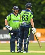 22 July 2022; Paul Stirling, left, and Andrew Balbirnie of Ireland during the Men's T20 International match between Ireland and New Zealand at Stormont in Belfast. Photo by Ramsey Cardy/Sportsfile