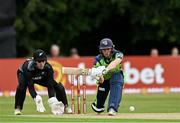 22 July 2022; Lorcan Tucker of Ireland and New Zealand wicketkeeper Dane Cleaver during the Men's T20 International match between Ireland and New Zealand at Stormont in Belfast. Photo by Ramsey Cardy/Sportsfile