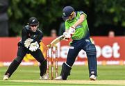 22 July 2022; Harry Tector of Ireland and New Zealand wicketkeeper Dane Cleaver during the Men's T20 International match between Ireland and New Zealand at Stormont in Belfast. Photo by Ramsey Cardy/Sportsfile