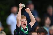 22 July 2022; An Ireland supporter celebrates a six during the Men's T20 International match between Ireland and New Zealand at Stormont in Belfast. Photo by Ramsey Cardy/Sportsfile