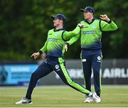 22 July 2022; George Dockrell, left, and Gareth Delany of Ireland during the Men's T20 International match between Ireland and New Zealand at Stormont in Belfast. Photo by Ramsey Cardy/Sportsfile