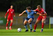 22 July 2022; Dara Keane of UCD in action against Jonathan Lunney of Shelbourne during the SSE Airtricity League Premier Division match between UCD and Shelbourne at the UCD Bowl in Belfield, Dublin. Photo by Seb Daly/Sportsfile