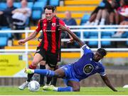 22 July 2022; Eric Molloy of Longford Town is tackled by Tunmise Sobowale of Waterford during the SSE Airtricity League First Division match between Waterford and Longford Town at RSC in Waterford. Photo by Michael P Ryan/Sportsfile