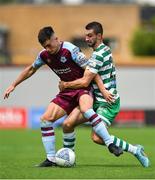 23 July 2022; Evan Weir of Drogheda United in action against Neil Farrugia of Shamrock Rovers during the SSE Airtricity League Premier Division match between Shamrock Rovers and Drogheda United at Tallaght Stadium in Dublin. Photo by Seb Daly/Sportsfile