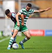 23 July 2022; Neil Farrugia of Shamrock Rovers in action against Evan Weir of Drogheda United  during the SSE Airtricity League Premier Division match between Shamrock Rovers and Drogheda United at Tallaght Stadium in Dublin. Photo by Seb Daly/Sportsfile