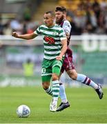 23 July 2022; Graham Burke of Shamrock Rovers in action against Gary Deegan of Drogheda United during the SSE Airtricity League Premier Division match between Shamrock Rovers and Drogheda United at Tallaght Stadium in Dublin. Photo by Seb Daly/Sportsfile