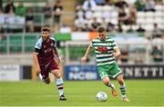 23 July 2022; Dylan Watts of Shamrock Rovers in action against Gary Deegan of Drogheda United during the SSE Airtricity League Premier Division match between Shamrock Rovers and Drogheda United at Tallaght Stadium in Dublin. Photo by Seb Daly/Sportsfile
