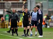 23 July 2022; Referee Derek Michael Tomney shows a yellow card to Drogheda United manager Kevin Doherty during the SSE Airtricity League Premier Division match between Shamrock Rovers and Drogheda United at Tallaght Stadium in Dublin. Photo by Seb Daly/Sportsfile