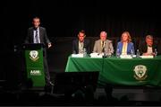 23 July 2022; Jonathan Hill, chief executive officer, FAI, addresses the assembly alongside members of the top table, from left, Gary Twohig, FAI director, Joe O'Brien, FAI director, Liz Joyce, FAI independent director, and Paul Cooke, FAI vice president, during the annual general meeting of the Football Association of Ireland at the Mansion House in Dublin. Photo by Stephen McCarthy/Sportsfile