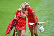 23 July 2022; Cork players Aoife Hurley, left, and Emma Flannagan celebrate after their side's victory in the Glen Dimplex Senior Camogie All-Ireland Championship Semi-Final match between Cork and Waterford at Croke Park in Dublin. Photo by Piaras Ó Mídheach/Sportsfile