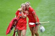 23 July 2022; Cork players Aoife Hurley, left, and Emma Flannagan celebrate after their side's victory in the Glen Dimplex Senior Camogie All-Ireland Championship Semi-Final match between Cork and Waterford at Croke Park in Dublin. Photo by Piaras Ó Mídheach/Sportsfile