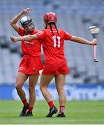 23 July 2022; Cork players Saoirse McCarthy, left, and Fiona Keating celebrate after their side's victory in the Glen Dimplex Senior Camogie All-Ireland Championship Semi-Final match between Cork and Waterford at Croke Park in Dublin. Photo by Piaras Ó Mídheach/Sportsfile
