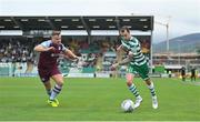 23 July 2022; Sean Kavanagh of Shamrock Rovers in action against Georgie Poynton of Drogheda United during the SSE Airtricity League Premier Division match between Shamrock Rovers and Drogheda United at Tallaght Stadium in Dublin. Photo by Seb Daly/Sportsfile