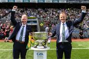24 July 2022; Former Kerry footballers, and brothers, Mike, left, and Liam Hassett bring out the Sam Maguire Cup before the GAA Football All-Ireland Senior Championship Final match between Kerry and Galway at Croke Park in Dublin. Photo by Stephen McCarthy/Sportsfile