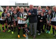 24 July 2022; FAI Amateur and Youth committee member Richard Browne presents the cup to Whitehall Rangers captain Charlie Graham after the FAI Women’s Intermediate Cup Final 2022 match between Douglas Hall LFC and Whitehall Rangers at Turners Cross in Cork. Photo by Michael P Ryan/Sportsfile