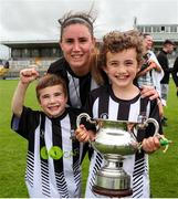 24 July 2022; Sinead O'Kelly of Whitehall Rangers with her son's, Jack age 5, left, and Scott age 8 after the FAI Women’s Intermediate Cup Final 2022 match between Douglas Hall LFC and Whitehall Rangers at Turners Cross in Cork. Photo by Michael P Ryan/Sportsfile